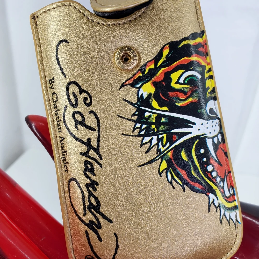 ED HARDY GOLD UNIVERSAL CELL PHONE CASE WITH LEATHER PULL & SNAP CLOSURE. $48.00